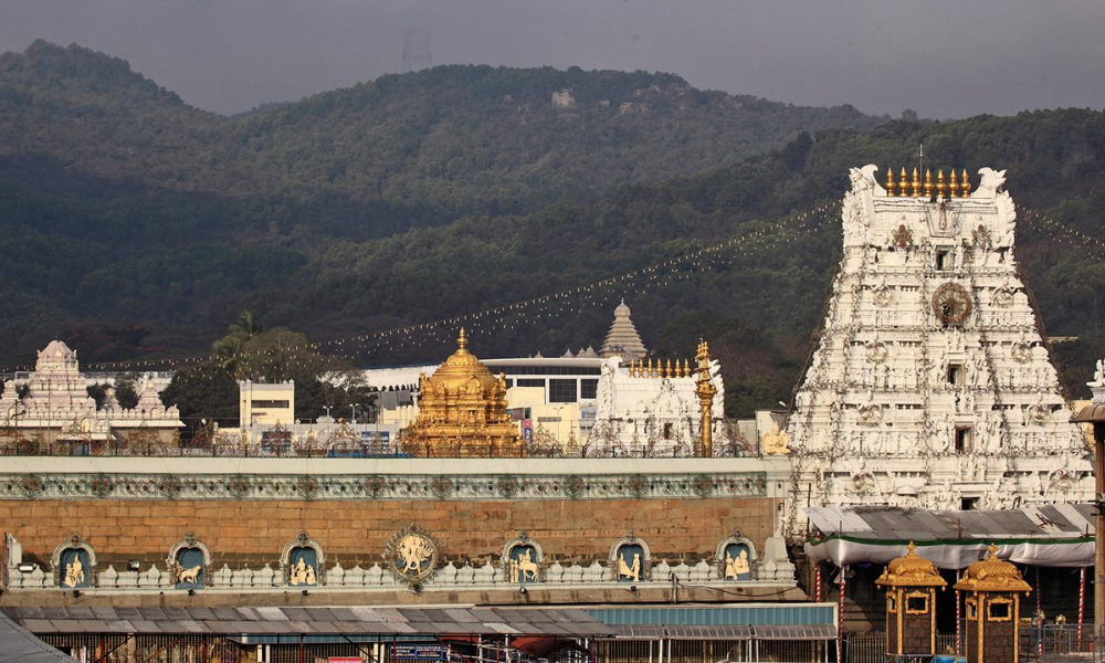 Tirumala Venkateswara Temple in Tirupati with white gopuram and hills backdrop